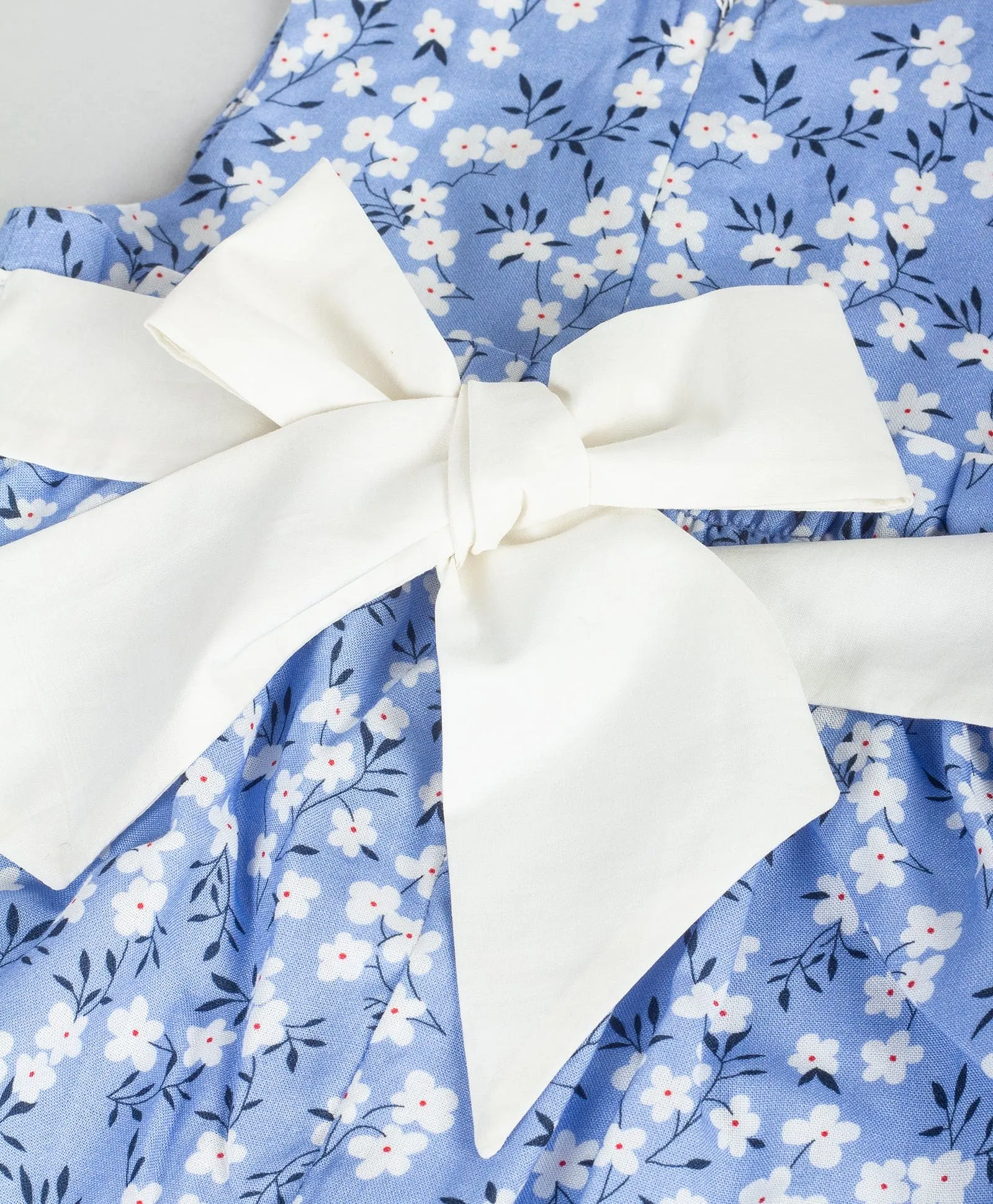 Ditsy print infant dress with white bow-Blue